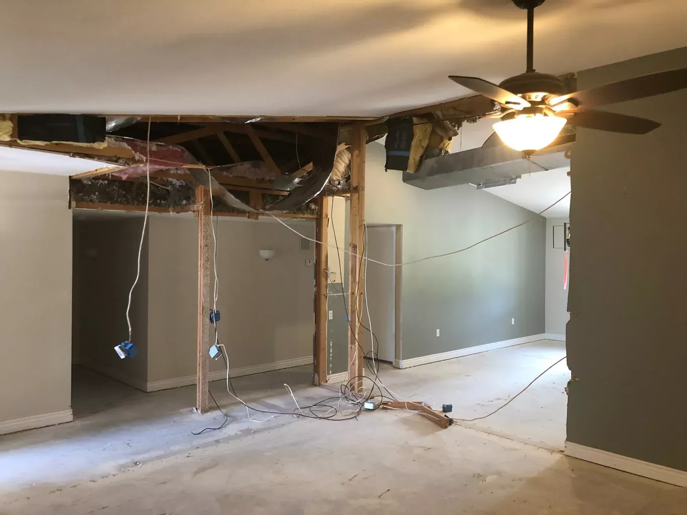Full interior strip-out with exposed framing during a remodel tear-out